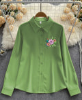 Fresh Blooms on Classic Green Top